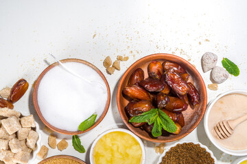 Various healthy diet replacement for sugar, natural organic sweetener concept, anti diabetes non-glycemic,  sweetener. Various fruit sugar, molasses, stevia, dates, coconut and date sugar, maple syrup