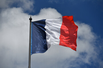 Naklejka na ściany i meble French flag floating in the wind.