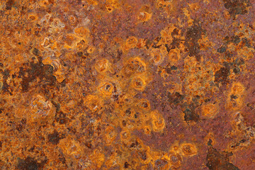 A close-up of rusting metal on a junkyard
