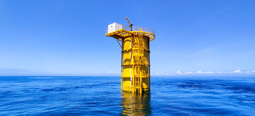 offshore construction of foundation for wind turbine to convert the wind's kinetic energy into...