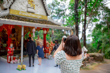 Travel to pay homage to monks in Thailand.