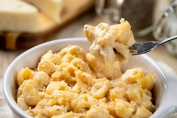 Macaroni and cheese on a fork