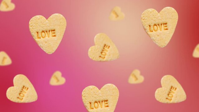 Minimal motion design 4k food animation. yellow Hearts Candy for Valentines Day. Pastel conversation hearts with text "Love".  animated wiggle and move at trending multi colored gradient background. H