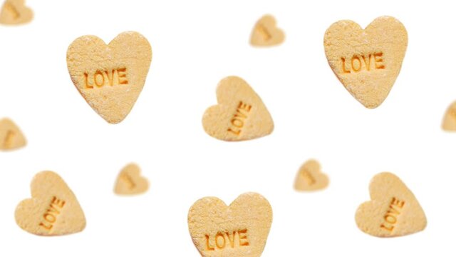 Animated Sweet hearts shaped yellow Sugar Pill flying and wigglein in the air  on isolated background. Valentines day, Date, Wedding, 8 March, Womens gift. Romantic love concept.  Minimal motion desig