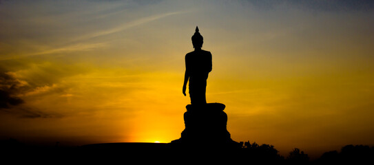 buddha statue at sunset