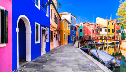 Most colorful places (towns) - Burano island, village with vivid houses near Venice, Italy travel and landmarks - obrazy, fototapety, plakaty