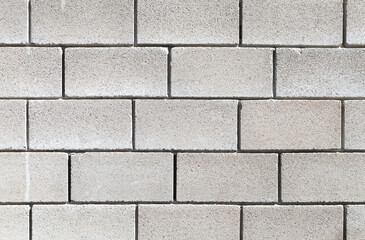 A wall made of foam concrete blocks, background texture