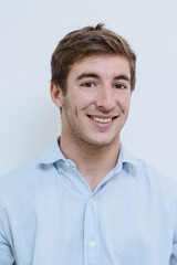 portrait of blond latin young man without beard smiling