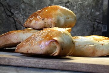 Asian traditional plate bread and samsa with beef filling
