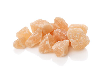 Pink himalayan salt stones, isolated on white background 