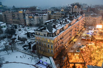 Evening view from St. Sophia Cathedral bell tower to Sofia Square during Christmas holidays in Kyiv, Ukraine