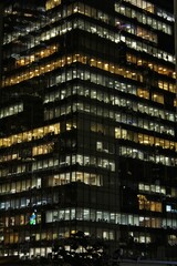 Fototapeta na wymiar Office Building Lights at Night