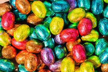 Over Head Shot Of Colourful Chocolate Easter Eggs On Table