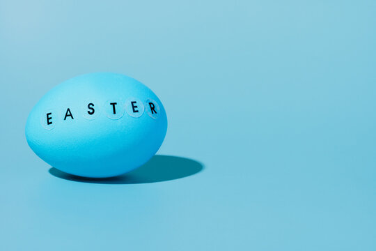 Blue egg with the word easter written on it