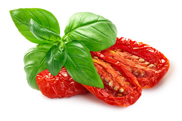 Dried or Sundried tomato halves with sweet  basil isolated - obrazy, fototapety, plakaty