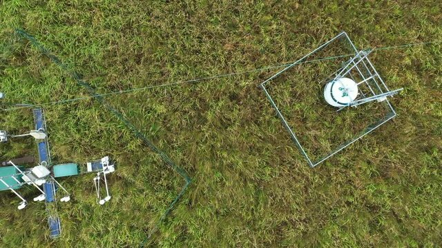 Station science research for studying wetlands meadows, drone aerial video shot ecosystem weather station swamp willows cycle carbon flux eddy covariance methane research physiological photosynthesis