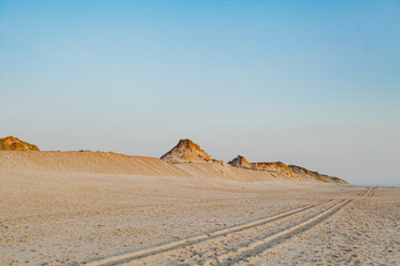 Dunes and Beach on Ocean Background