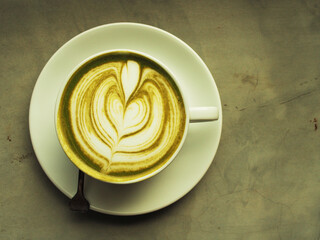 hot green tea and smartphone next to windown relaxing and rest time