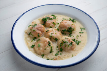 Hake meatballs with onion sauce. Traditional Spanish recipe.