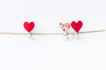 Design heart clip on rope isolate on white background, valentine card background idea, love and romance symbole