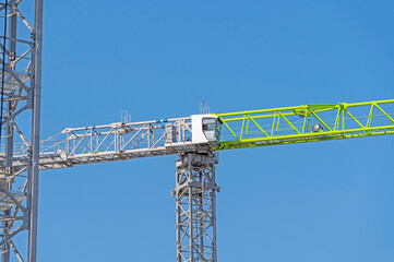 Fototapeta na wymiar construction crane at blue sky background