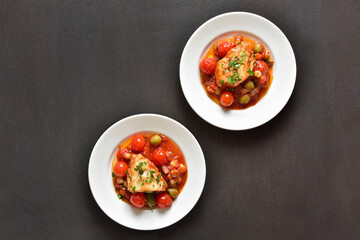 Cod stew with chickpeas, cherry tomatoes and olives