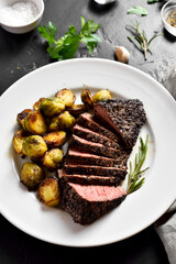 Grilled beef steak with brussels sprouts