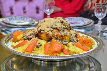 Moroccan couscous with chicken, red squash, carrots and chickpeas. The traditional Arabic couscous.