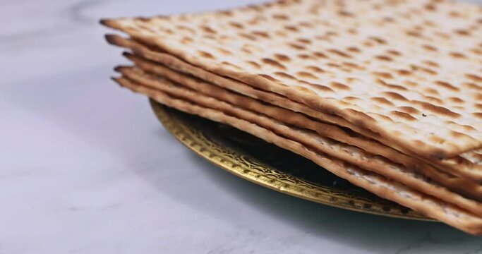 Pesach Passover celebrating symbols of great Jewish family holiday traditional matzah, seder, kippah and tallit, torah scroll