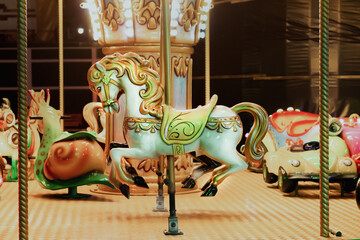 Vintage fair horse carousel in amusement park © Дмитрий Сидор