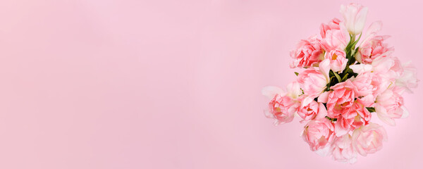 Fototapeta na wymiar Creative spring background composition colorful flowers on pink background.