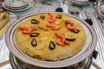 Fresh baked Moroccan fish pastilla