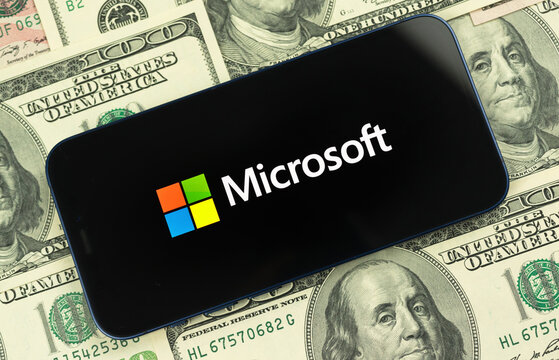 Mobile phone with microsoft company logo. Business, stock trade concept photo