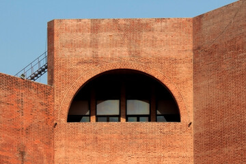 a large brick building with archedsemi circular window