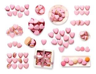 Tasty heart-shaped macaroons on white background, top view. Valentine's Day celebration
