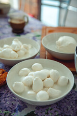 Mozzarella di bufala on a white plate ready to eat. italian food.