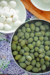 Green and black olives. in water salted fresh. olive oil