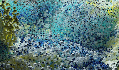 3d render of abstract art 3d background with part of surreal explosion powder foam cloud based on small balls spheres or bubbles particles in yellow blue and white color in plastic and metal material 