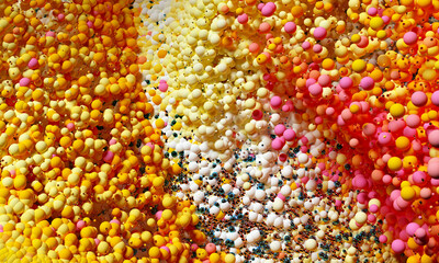 3d render of abstract art 3d background with surreal small and big festive party balls spheres balloons or bubbles in plastic glass and metal material in white yellow red orange gold and blue color