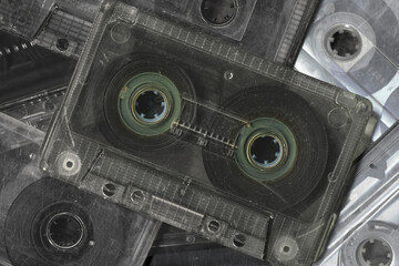 Vintage audio cassette tapes placed next to each other. Obsolete technology of audio recording and...