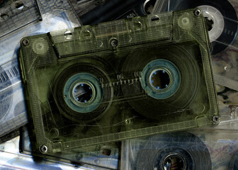 Vintage audio cassette tapes placed next to each other. Obsolete technology of audio recording and...