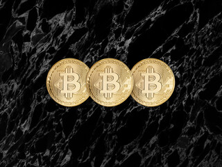 Cryptocurrency Bitcoin on  black marble background.