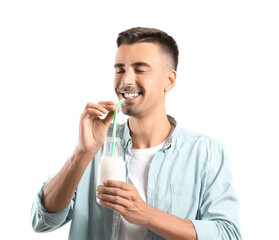 Young man with bottle of milk on white background