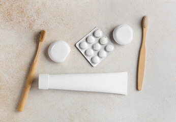Set of dental hygiene on light background