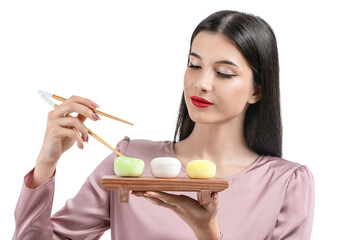 Beautiful young woman with tasty Japanese mochi isolated on white