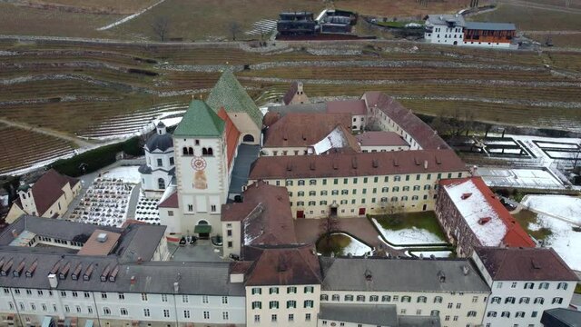 Ancient abbey of Novacella. Pearl among the vineyards of South Tyrol.
