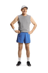 Full length portrait of an elderly man in sportswear looking at camera