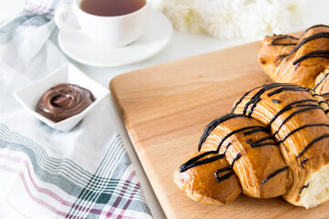 croissant and cup of tea