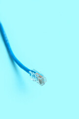 Modern internet cable on blue background