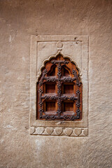 A small carved wooden window in Jaisalmer Fort, Rajasthan, India.